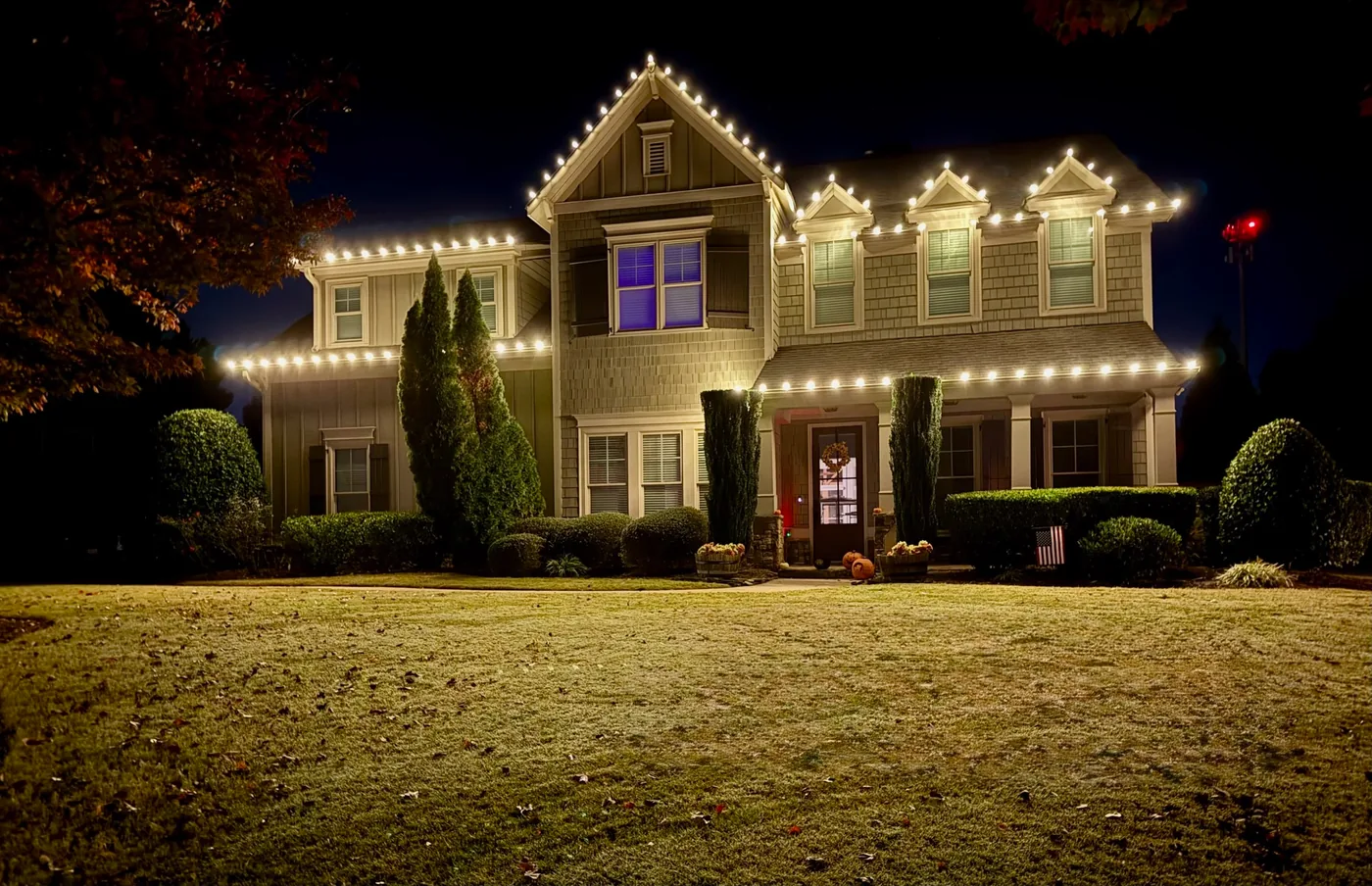 Bright Lights GA crew installing Christmas lights on a Metro Atlanta home