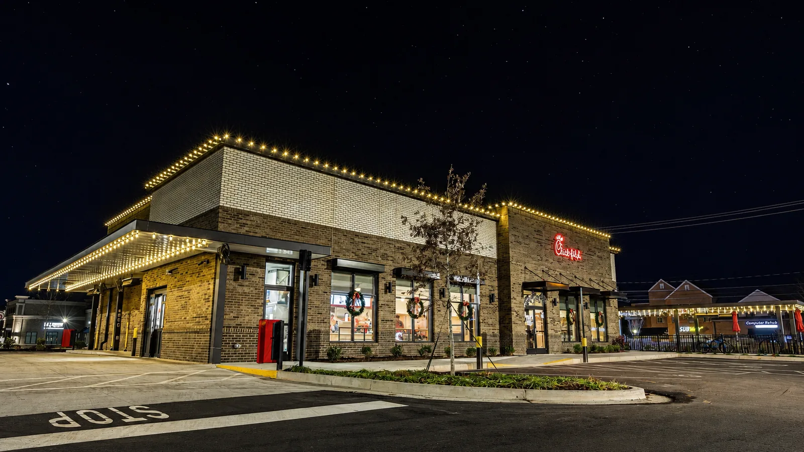 Building and facade holiday lighting on a Metro Atlanta office