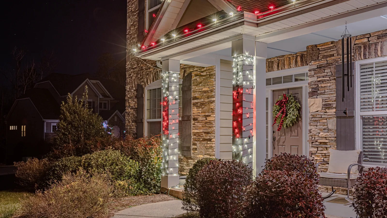 Columns and windows accented with holiday lighting